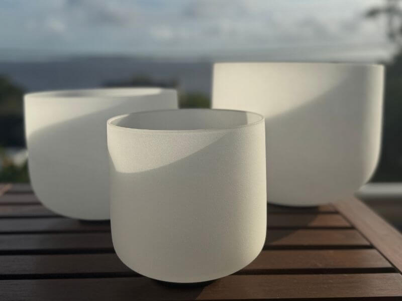 Collection of crystal singing bowls used for chakra healing and sound bath meditations at Soul2Source in Western Sydney.